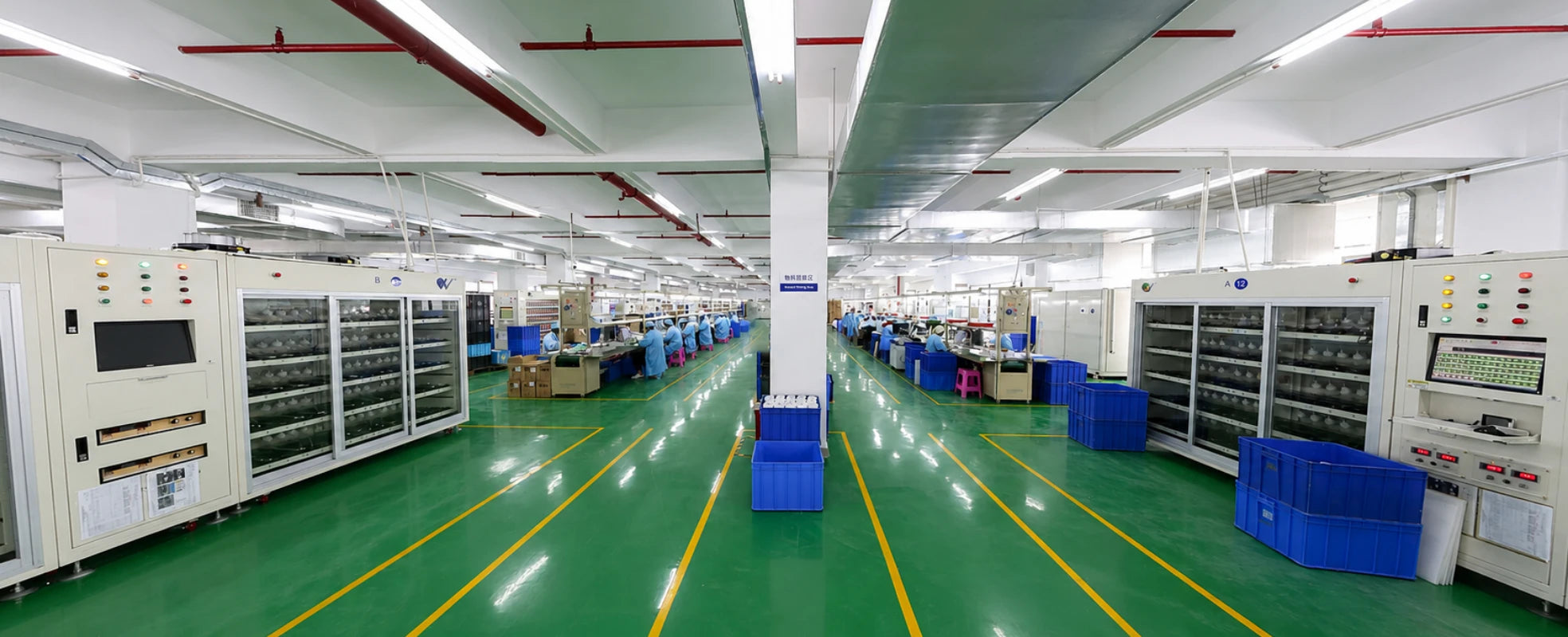 Momfree breast pump manufacturing facility with automated testing equipment and organized production lines