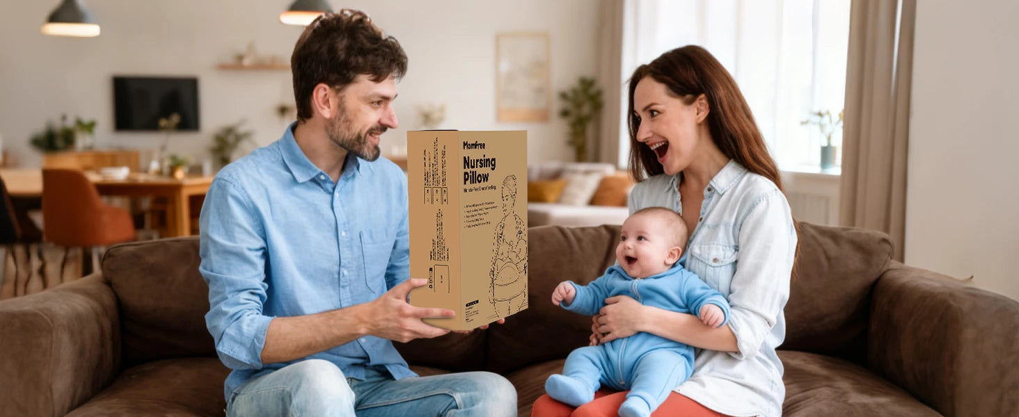 Parents receiving a boxed Momfree MF016 nursing pillow as a practical gift for supervised feeding