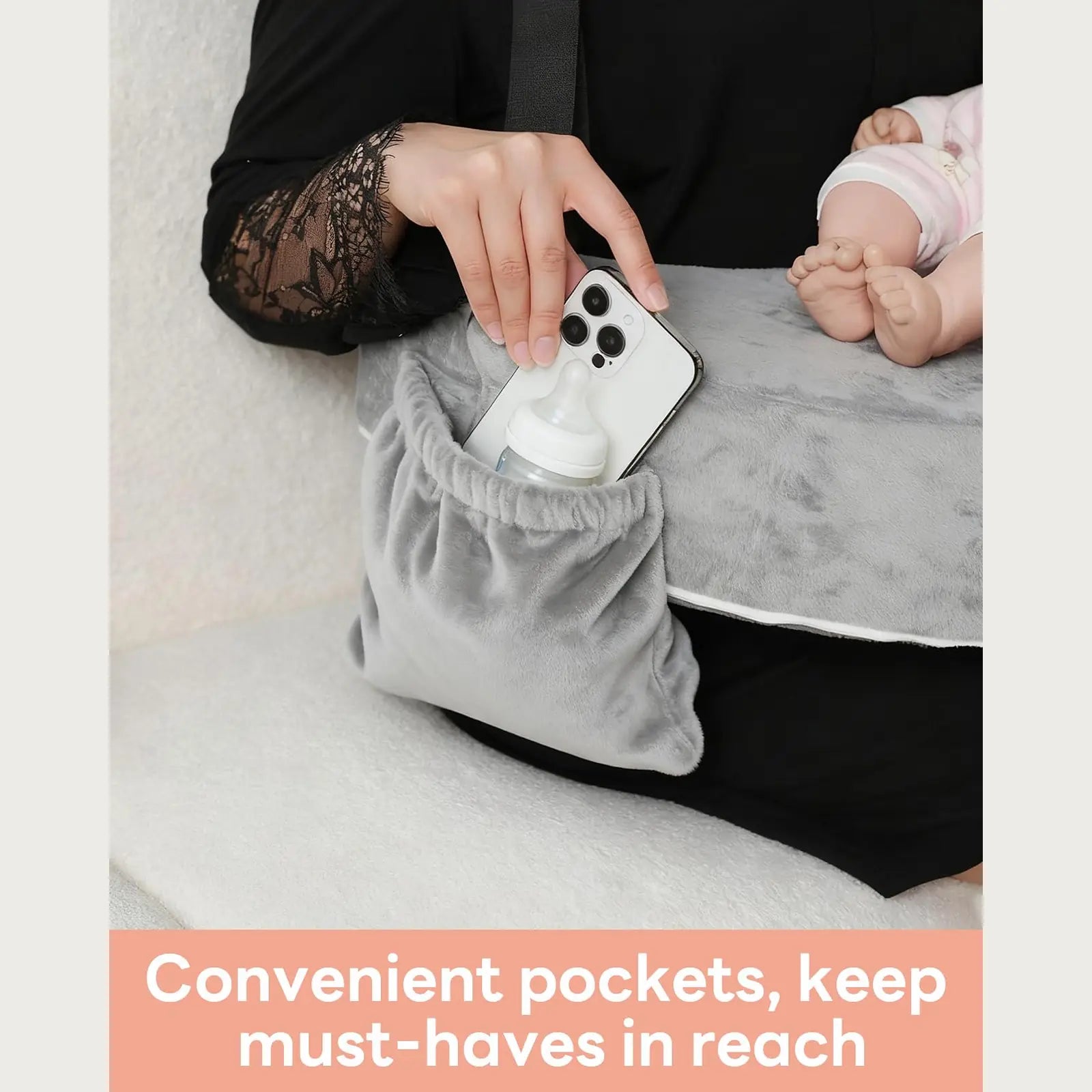 Built-in storage pocket on the Momfree MF016 nursing pillow holding a phone and baby bottle
